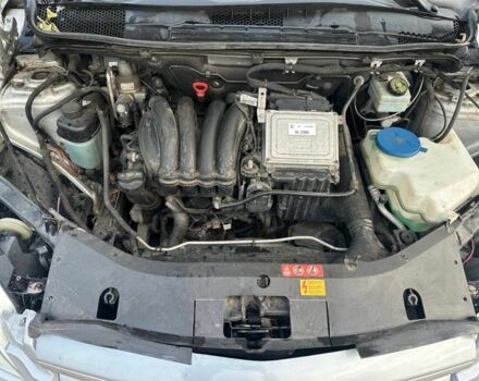 Серый Мерседес 200, объемом двигателя 2 л и пробегом 230 тыс. км за 6459 $, фото 5 на Automoto.ua