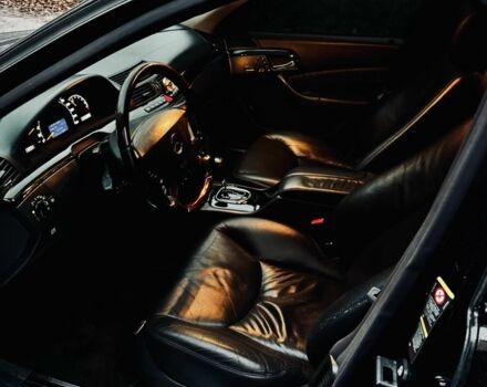 Чорний Мерседес 220, об'ємом двигуна 5 л та пробігом 268 тис. км за 9511 $, фото 4 на Automoto.ua