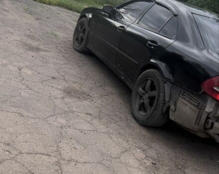 Черный Мерседес 320, объемом двигателя 3.2 л и пробегом 350 тыс. км за 2383 $, фото 2 на Automoto.ua