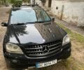 Чорний Мерседес 320, об'ємом двигуна 3 л та пробігом 317 тис. км за 7767 $, фото 1 на Automoto.ua