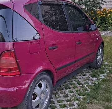 Фиолетовый Мерседес А класс, объемом двигателя 1.4 л и пробегом 245 тыс. км за 3000 $, фото 1 на Automoto.ua