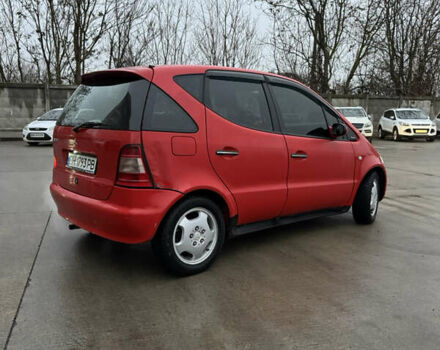 Красный Мерседес А класс, объемом двигателя 1.6 л и пробегом 268 тыс. км за 2999 $, фото 3 на Automoto.ua