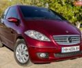 Красный Мерседес А класс, объемом двигателя 1.7 л и пробегом 150 тыс. км за 6000 $, фото 1 на Automoto.ua