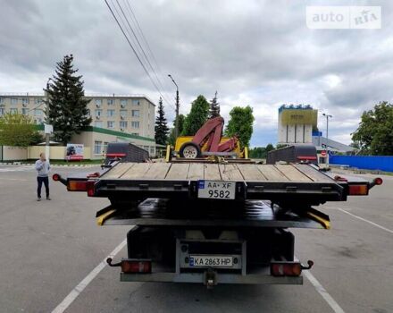 Желтый Мерседес Атего, объемом двигателя 6 л и пробегом 407 тыс. км за 57000 $, фото 2 на Automoto.ua