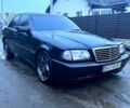 Черный Мерседес Ц-Класс, объемом двигателя 1.8 л и пробегом 230 тыс. км за 3600 $, фото 1 на Automoto.ua