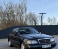 Черный Мерседес Ц-Класс, объемом двигателя 1.8 л и пробегом 350 тыс. км за 2000 $, фото 1 на Automoto.ua