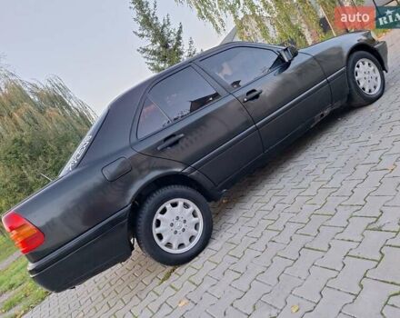 Чорний Мерседес Ц-Клас, об'ємом двигуна 1.8 л та пробігом 293 тис. км за 1600 $, фото 12 на Automoto.ua