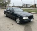 Чорний Мерседес Ц-Клас, об'ємом двигуна 2 л та пробігом 350 тис. км за 1750 $, фото 1 на Automoto.ua
