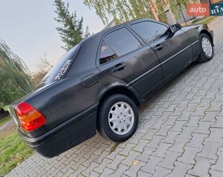 Чорний Мерседес Ц-Клас, об'ємом двигуна 1.8 л та пробігом 293 тис. км за 1550 $, фото 6 на Automoto.ua