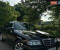 Черный Мерседес Ц-Класс, объемом двигателя 1.8 л и пробегом 308 тыс. км за 1999 $, фото 1 на Automoto.ua