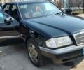 Черный Мерседес Ц-Класс, объемом двигателя 2.5 л и пробегом 410 тыс. км за 4700 $, фото 1 на Automoto.ua