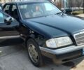 Черный Мерседес Ц-Класс, объемом двигателя 2.5 л и пробегом 410 тыс. км за 4700 $, фото 1 на Automoto.ua