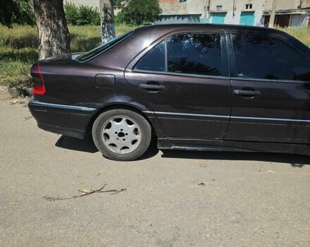 Мерседес Ц-Клас 1996 у Харкові на Automoto.ua Чорний Мерседес Ц-Клас, об'ємом двигуна 2.3 л та пробігом 427 тис. км за 3200 $, фото 1 на Automoto.ua