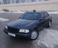 Чорний Мерседес Ц-Клас, об'ємом двигуна 2 л та пробігом 710 тис. км за 3000 $, фото 1 на Automoto.ua