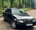 Черный Мерседес Ц-Класс, объемом двигателя 1.8 л и пробегом 200 тыс. км за 2300 $, фото 1 на Automoto.ua