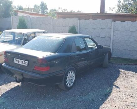 Черный Мерседес Ц-Класс, объемом двигателя 1.8 л и пробегом 560 тыс. км за 1850 $, фото 2 на Automoto.ua