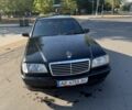 Черный Мерседес Ц-Класс, объемом двигателя 1.8 л и пробегом 382 тыс. км за 2400 $, фото 1 на Automoto.ua