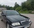 Черный Мерседес Ц-Класс, объемом двигателя 1.8 л и пробегом 395 тыс. км за 2700 $, фото 1 на Automoto.ua