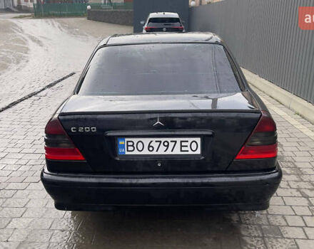Чорний Мерседес Ц-Клас, об'ємом двигуна 2 л та пробігом 260 тис. км за 2598 $, фото 4 на Automoto.ua