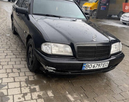 Чорний Мерседес Ц-Клас, об'ємом двигуна 2 л та пробігом 260 тис. км за 2598 $, фото 2 на Automoto.ua