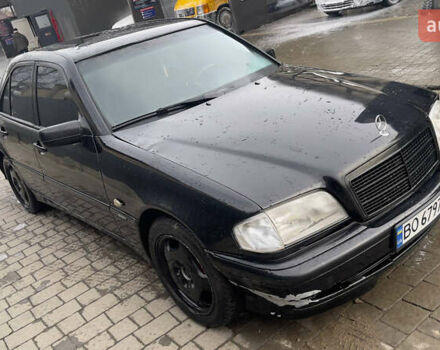 Чорний Мерседес Ц-Клас, об'ємом двигуна 2 л та пробігом 260 тис. км за 2598 $, фото 3 на Automoto.ua
