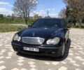 Черный Мерседес Ц-Класс, объемом двигателя 2.1 л и пробегом 370 тыс. км за 4199 $, фото 1 на Automoto.ua
