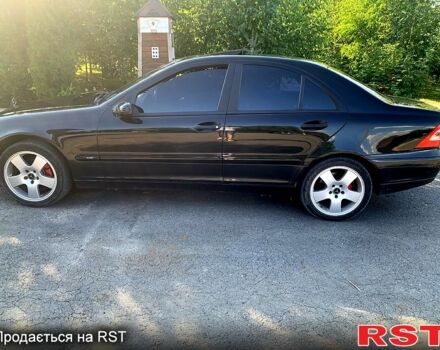 Черный Мерседес Ц-Класс, объемом двигателя 1.8 л и пробегом 240 тыс. км за 5500 $, фото 1 на Automoto.ua