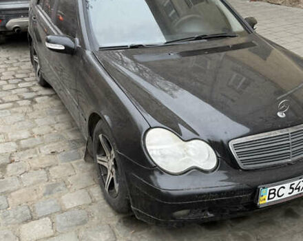 Черный Мерседес Ц-Класс, объемом двигателя 1.8 л и пробегом 372 тыс. км за 4200 $, фото 1 на Automoto.ua