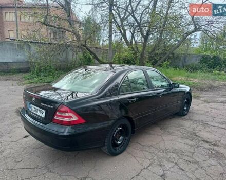 Черный Мерседес Ц-Класс, объемом двигателя 1.8 л и пробегом 288 тыс. км за 5000 $, фото 26 на Automoto.ua