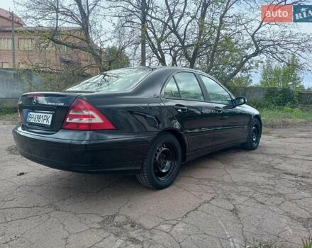 Черный Мерседес Ц-Класс, объемом двигателя 1.8 л и пробегом 288 тыс. км за 5000 $, фото 27 на Automoto.ua