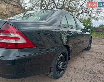 Черный Мерседес Ц-Класс, объемом двигателя 1.8 л и пробегом 288 тыс. км за 5000 $, фото 1 на Automoto.ua