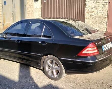 Черный Мерседес Ц-Класс, объемом двигателя 1.8 л и пробегом 200 тыс. км за 7350 $, фото 1 на Automoto.ua