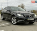 Черный Мерседес Ц-Класс, объемом двигателя 1.8 л и пробегом 147 тыс. км за 11950 $, фото 1 на Automoto.ua