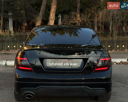 Чорний Мерседес Ц-Клас, об'ємом двигуна 1.8 л та пробігом 176 тис. км за 11999 $, фото 7 на Automoto.ua