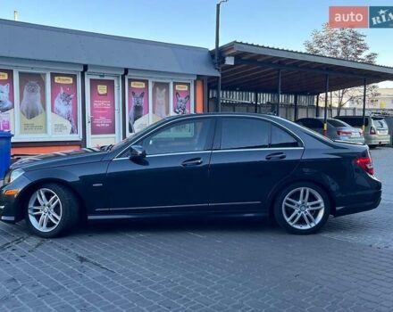 Черный Мерседес Ц-Класс, объемом двигателя 1.8 л и пробегом 243 тыс. км за 10900 $, фото 1 на Automoto.ua