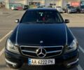 Черный Мерседес Ц-Класс, объемом двигателя 1.8 л и пробегом 115 тыс. км за 13800 $, фото 1 на Automoto.ua