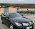 Черный Мерседес Ц-Класс, объемом двигателя 1.8 л и пробегом 235 тыс. км за 12400 $, фото 1 на Automoto.ua