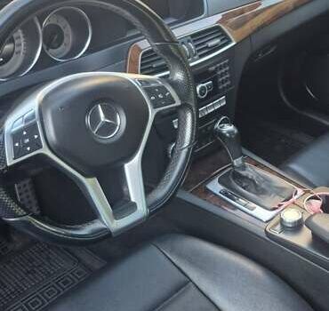 Чорний Мерседес Ц-Клас, об'ємом двигуна 1.8 л та пробігом 152 тис. км за 9800 $, фото 7 на Automoto.ua