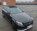 Черный Мерседес Ц-Класс, объемом двигателя 2 л и пробегом 105 тыс. км за 21500 $, фото 1 на Automoto.ua