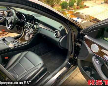 Чорний Мерседес Ц-Клас, об'ємом двигуна 2 л та пробігом 93 тис. км за 22200 $, фото 9 на Automoto.ua