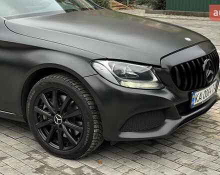 Чорний Мерседес Ц-Клас, об'ємом двигуна 2 л та пробігом 112 тис. км за 23200 $, фото 1 на Automoto.ua