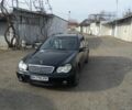 Черный Мерседес Ц-Класс, объемом двигателя 1.8 л и пробегом 226 тыс. км за 6300 $, фото 1 на Automoto.ua