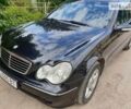 Черный Мерседес Ц-Класс, объемом двигателя 1.8 л и пробегом 243 тыс. км за 5800 $, фото 1 на Automoto.ua