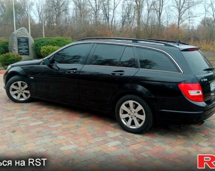 Черный Мерседес Ц-Класс, объемом двигателя 1.8 л и пробегом 250 тыс. км за 9300 $, фото 2 на Automoto.ua