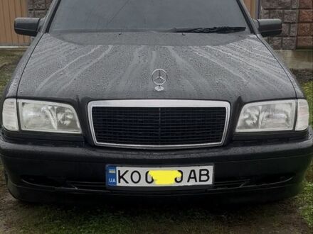 Черный Мерседес Ц-Класс, объемом двигателя 1.8 л и пробегом 400 тыс. км за 2500 $, фото 1 на Automoto.ua