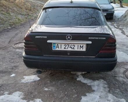 Черный Мерседес Ц-Класс, объемом двигателя 1.8 л и пробегом 273 тыс. км за 2700 $, фото 1 на Automoto.ua