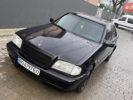 Черный Мерседес Ц-Класс, объемом двигателя 2 л и пробегом 260 тыс. км за 2598 $, фото 1 на Automoto.ua