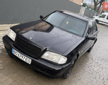 Чорний Мерседес Ц-Клас, об'ємом двигуна 2 л та пробігом 260 тис. км за 2598 $, фото 1 на Automoto.ua