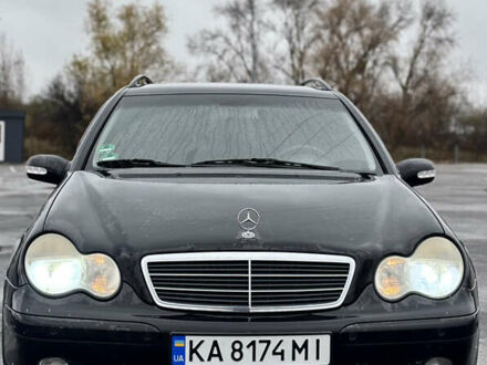 Черный Мерседес Ц-Класс, объемом двигателя 1.8 л и пробегом 165 тыс. км за 3999 $, фото 1 на Automoto.ua