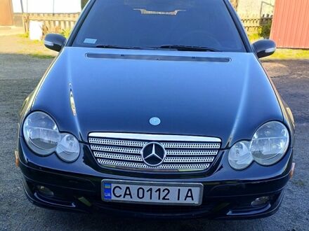 Чорний Мерседес Ц-Клас, об'ємом двигуна 1.8 л та пробігом 200 тис. км за 7000 $, фото 1 на Automoto.ua